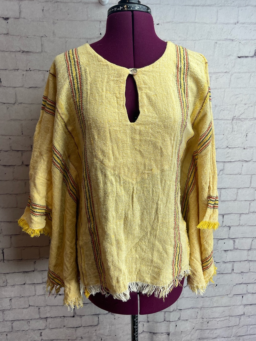 Jen’s pirate booty yellow serape poncho style top one size fits like a small